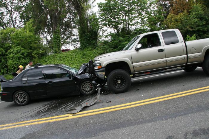 Police hold on vehicle after accident