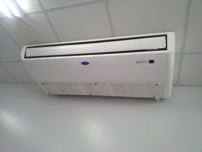 Self contained ceiling mounted air conditioners